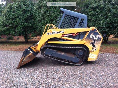 pink mustang skid steer|mustang track loader.